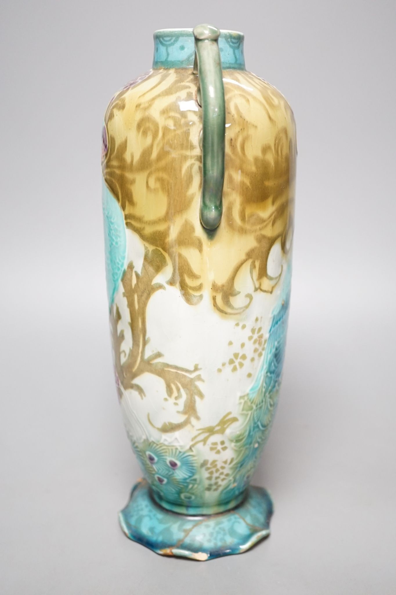 An Art Nouveau/Secessionist style Mintons ‘peacock’ vase (a.f.) 29cm